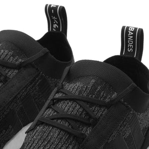 Style code AQ0949. adidas NMD Racer PK / Core Black